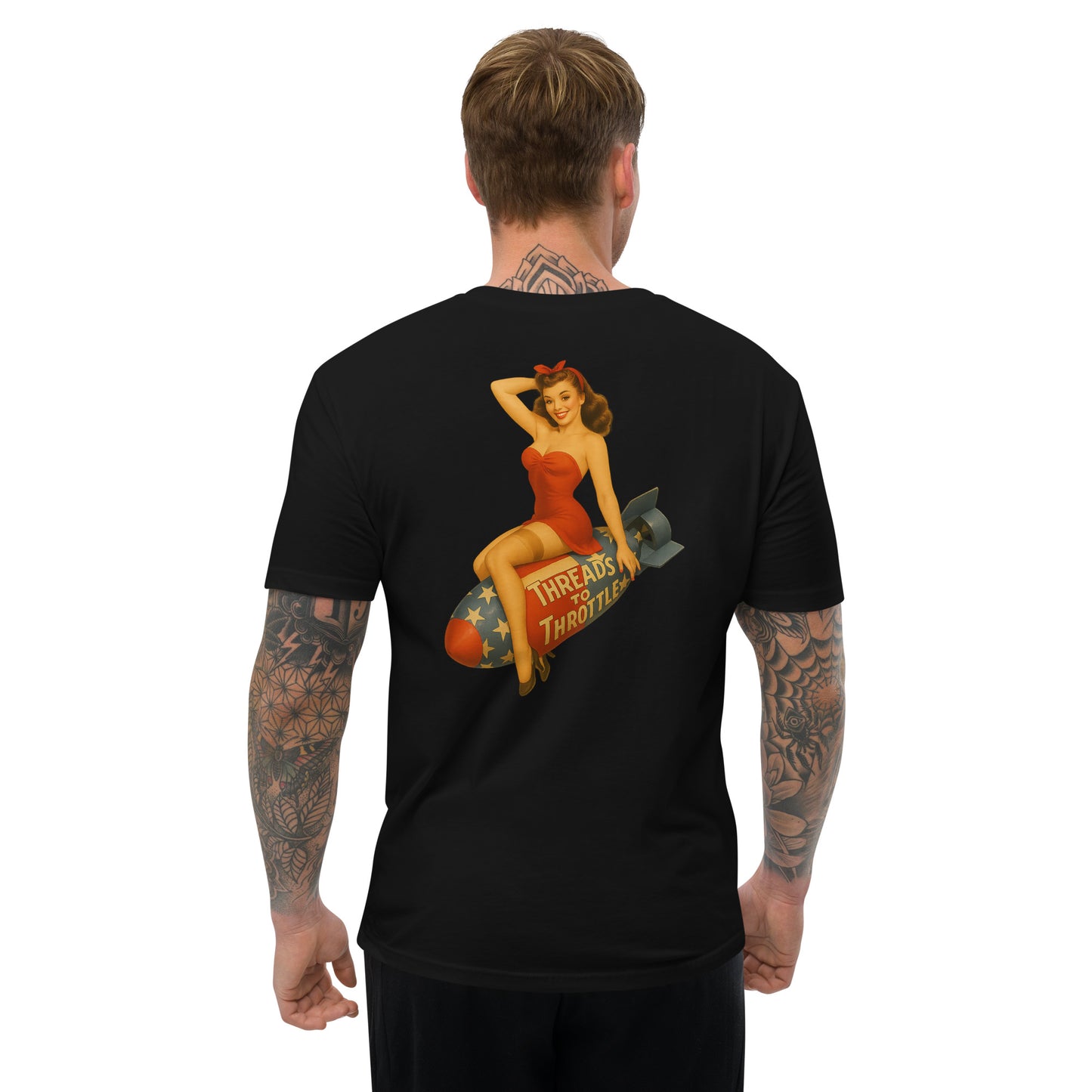 Pin-up girl on a flag painted bomb on a black t-shirt worn by model