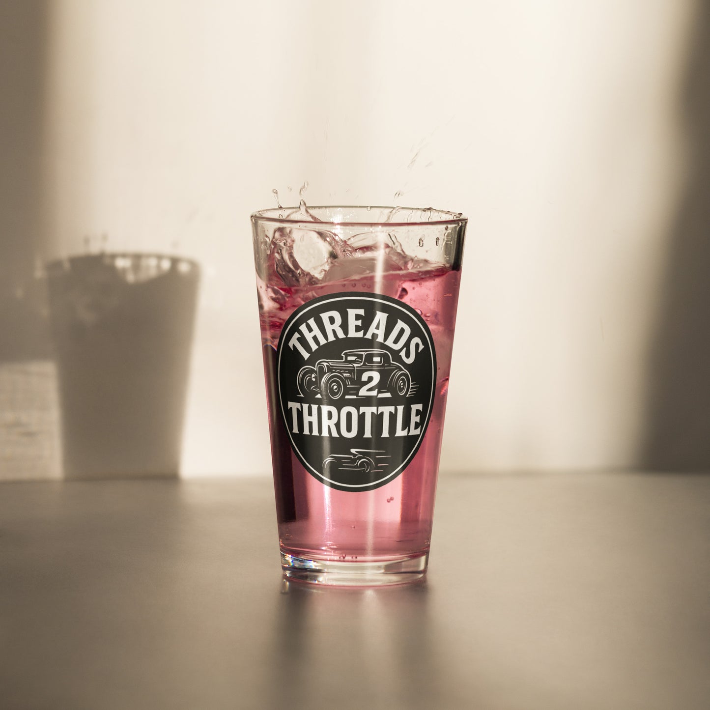 retro racing style pint glass with hot rod artwork